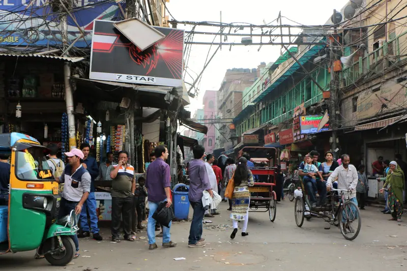 Rickshaws and shoppers on Chandni Chowk, Old Delhi